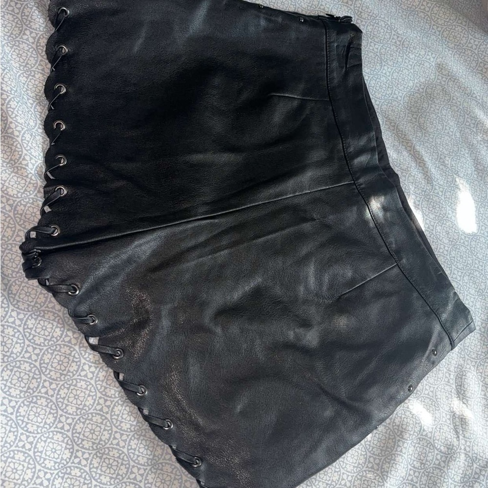 Chic Black Leather Skirt with Eyelet Detail